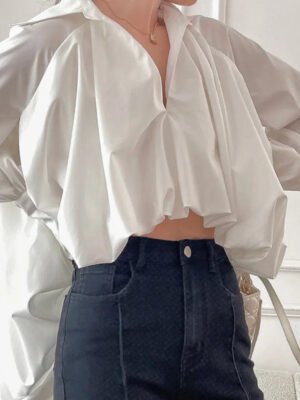 H5c690f1c3b3246439fbf51188f98bae2n New Arrival Women Casual Shirt Court Wind Puff Sleeve Women Irregular Waist Hollow Out Shirt